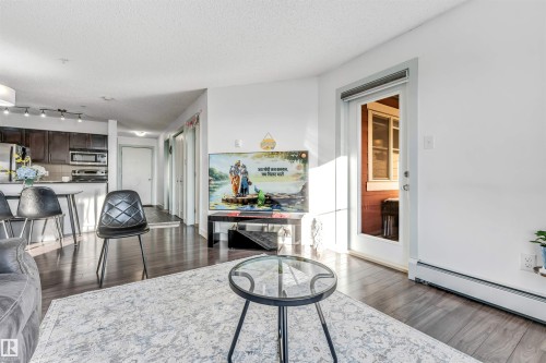 308 1080 Mcconachie Boulevard Nw, Edmonton, AB - Indoor Photo Showing Living Room