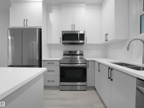 3331 Roy Brown Way, Edmonton, AB - Indoor Photo Showing Kitchen With Double Sink With Upgraded Kitchen