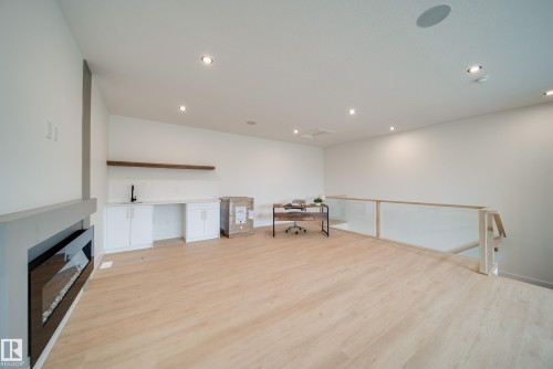 21 20425 93 Avenue, Edmonton, AB - Indoor Photo Showing Other Room With Fireplace