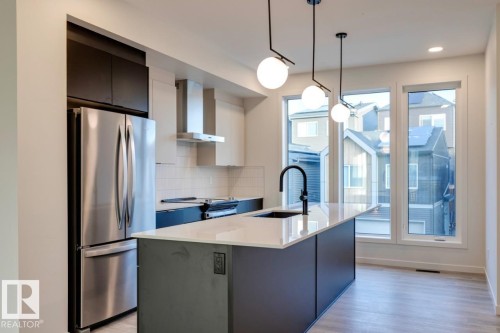 7513 Klapstein Link Link, Edmonton, AB - Indoor Photo Showing Kitchen With Upgraded Kitchen