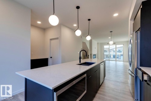 7513 Klapstein Link Link, Edmonton, AB - Indoor Photo Showing Kitchen With Double Sink With Upgraded Kitchen