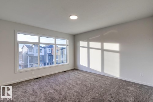 7513 Klapstein Link Link, Edmonton, AB - Indoor Photo Showing Other Room