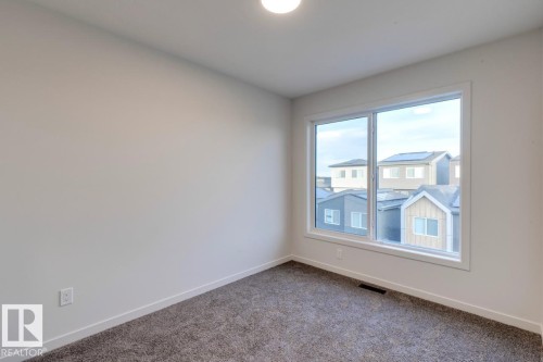 7513 Klapstein Link Link, Edmonton, AB - Indoor Photo Showing Other Room