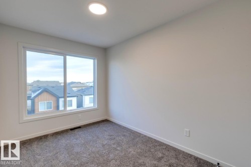 7513 Klapstein Link Link, Edmonton, AB - Indoor Photo Showing Other Room