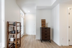 Bedroom featuring light wood-style flooring and baseboards - 
