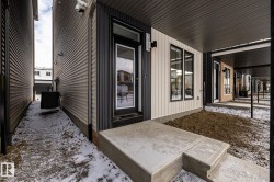 View of exterior entry featuring a porch - 