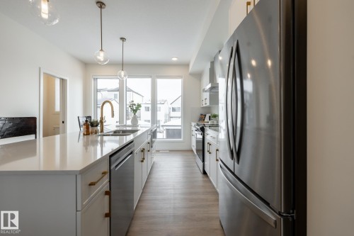 7529 Klapstein Link, Edmonton, AB - Indoor Photo Showing Kitchen With Double Sink With Upgraded Kitchen