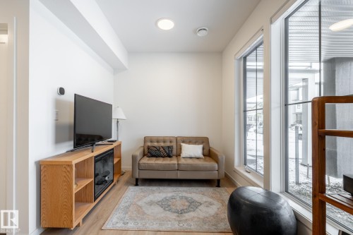 7529 Klapstein Link, Edmonton, AB - Indoor With Fireplace