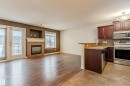28 9511 102 Ave, Morinville, AB  - Indoor With Fireplace 