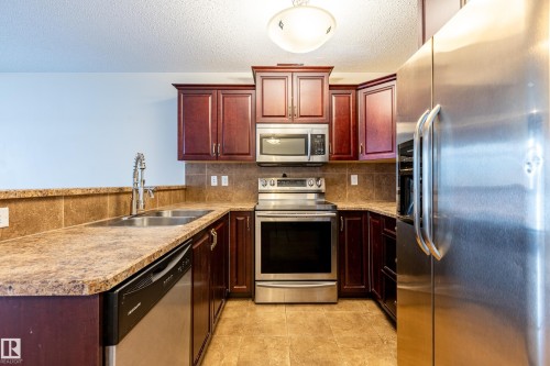 28 9511 102 Ave, Morinville, AB - Indoor Photo Showing Kitchen With Stainless Steel Kitchen With Double Sink