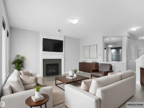 5903 12 Avenue, Edmonton, AB - Indoor Photo Showing Living Room With Fireplace