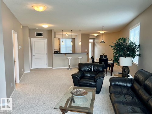 400 9940 Sherridon Drive, Fort Saskatchewan, AB - Indoor Photo Showing Living Room