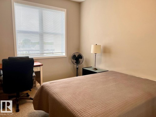 400 9940 Sherridon Drive, Fort Saskatchewan, AB - Indoor Photo Showing Bedroom