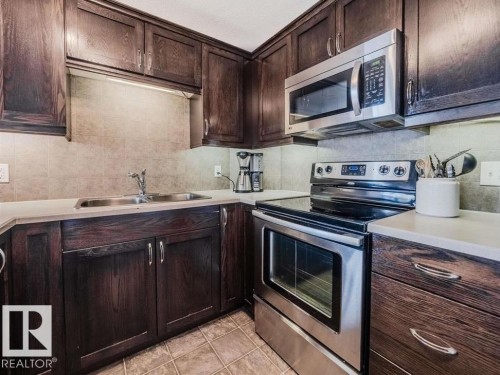 1306 7339 South Terwillegar Drive, Edmonton, AB - Indoor Photo Showing Kitchen With Double Sink