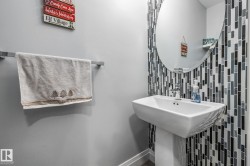 Half bath with backsplash and baseboards - 