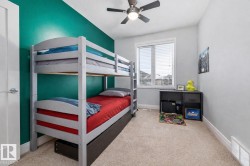 Bedroom with carpet flooring and ceiling fan - 