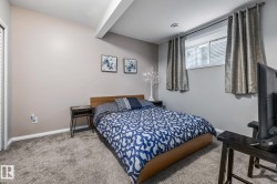 Bedroom with carpet and beamed ceiling - 