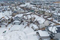 Snowy aerial view featuring a residential view - 