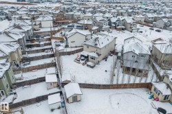 Snowy aerial view with a residential view - 