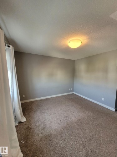 157 Radcliffe Wynd, Fort Saskatchewan, AB - Indoor Photo Showing Other Room