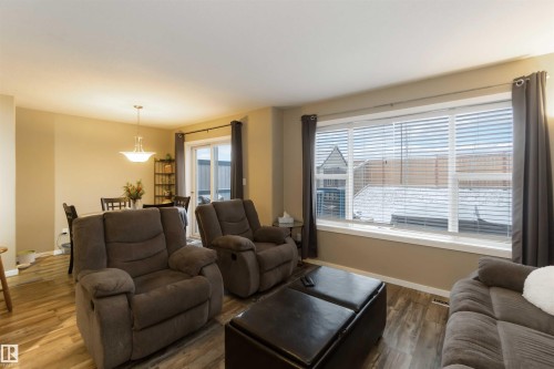 109 Rue Magnan, Beaumont, AB - Indoor Photo Showing Living Room