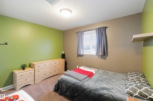 109 Rue Magnan, Beaumont, AB - Indoor Photo Showing Bedroom