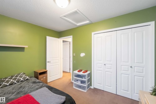 109 Rue Magnan, Beaumont, AB - Indoor Photo Showing Bedroom