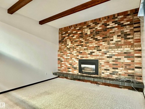 4603 Lakeshore Drive, Bonnyville Town, AB - Indoor Photo Showing Other Room With Fireplace