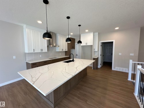 145 Elm Street, Fort Saskatchewan, AB - Indoor Photo Showing Kitchen With Upgraded Kitchen