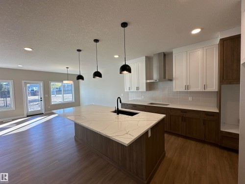 145 Elm Street, Fort Saskatchewan, AB - Indoor Photo Showing Kitchen With Upgraded Kitchen