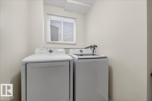 4911 43 Avenue, Beaumont, AB - Indoor Photo Showing Laundry Room