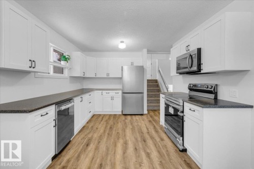 4911 43 Avenue, Beaumont, AB - Indoor Photo Showing Kitchen