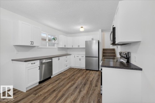 4911 43 Avenue, Beaumont, AB - Indoor Photo Showing Kitchen With Stainless Steel Kitchen