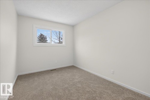 4911 43 Avenue, Beaumont, AB - Indoor Photo Showing Other Room