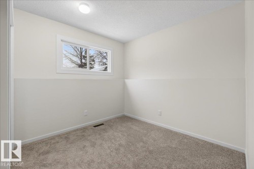 4911 43 Avenue, Beaumont, AB - Indoor Photo Showing Other Room