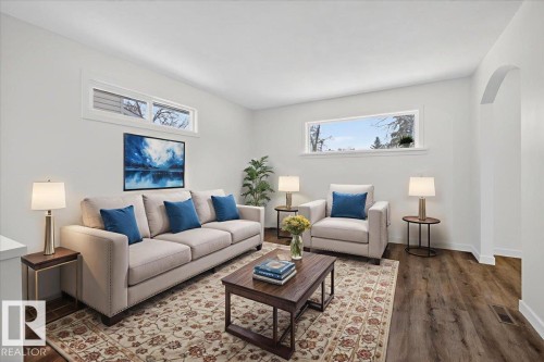 4911 43 Avenue, Beaumont, AB - Indoor Photo Showing Living Room