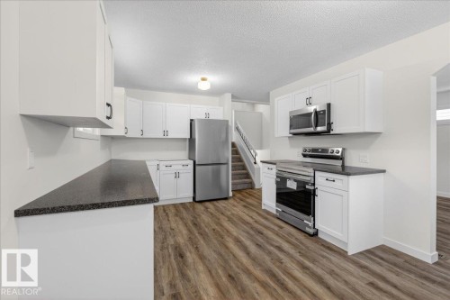 4911 43 Avenue, Beaumont, AB - Indoor Photo Showing Kitchen With Stainless Steel Kitchen