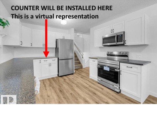 4911 43 Avenue, Beaumont, AB - Indoor Photo Showing Kitchen With Stainless Steel Kitchen