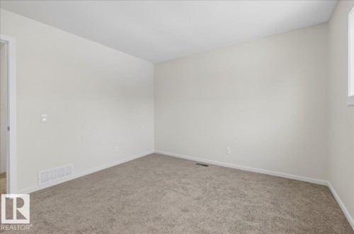 4911 43 Avenue, Beaumont, AB - Indoor Photo Showing Other Room