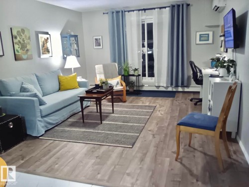 135 592 Hooke Road, Edmonton, AB - Indoor Photo Showing Living Room