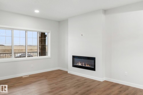 11 Sereno Lane, Fort Saskatchewan, AB - Indoor Photo Showing Living Room With Fireplace