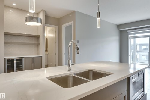406 528 Griesbach Parade, Edmonton, AB - Indoor Photo Showing Kitchen With Double Sink