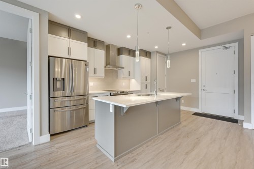 406 528 Griesbach Parade, Edmonton, AB - Indoor Photo Showing Kitchen With Upgraded Kitchen