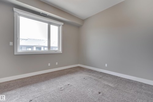 406 528 Griesbach Parade, Edmonton, AB - Indoor Photo Showing Other Room