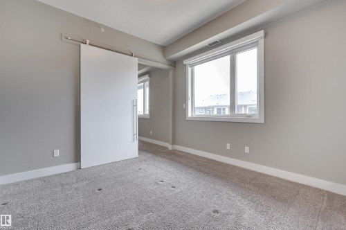 406 528 Griesbach Parade, Edmonton, AB - Indoor Photo Showing Other Room