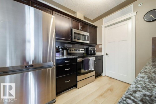 412 16235 51 Street, Edmonton, AB - Indoor Photo Showing Kitchen With Stainless Steel Kitchen
