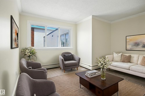 306 10160 83 Avenue, Edmonton, AB - Indoor Photo Showing Living Room