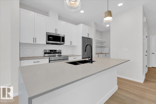 1142 South Creek Wynd, Stony Plain, AB - Indoor Photo Showing Kitchen With Double Sink With Upgraded Kitchen