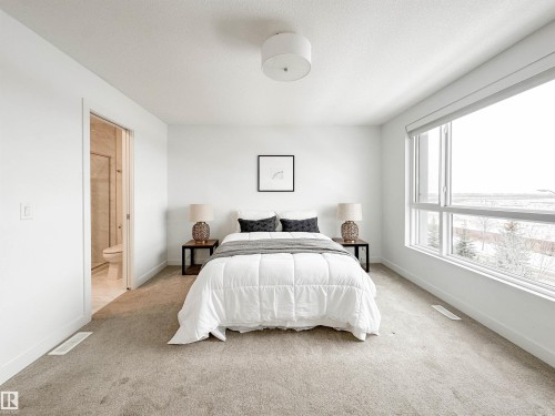 14 100 Jensen Boulevard, St. Albert, AB - Indoor Photo Showing Bedroom