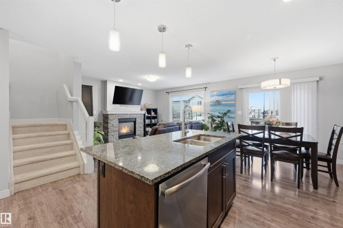 140 Axbridge Gate, Sherwood Park, AB - Indoor Photo Showing Other Room With Fireplace